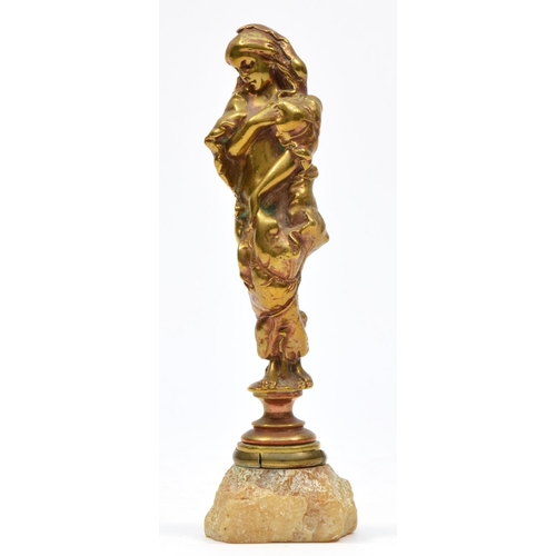 200 - A German Art Nouveau bronze desk seal, c.1910, depicting a naked lady wrapped in a leaf, indistinctl... 