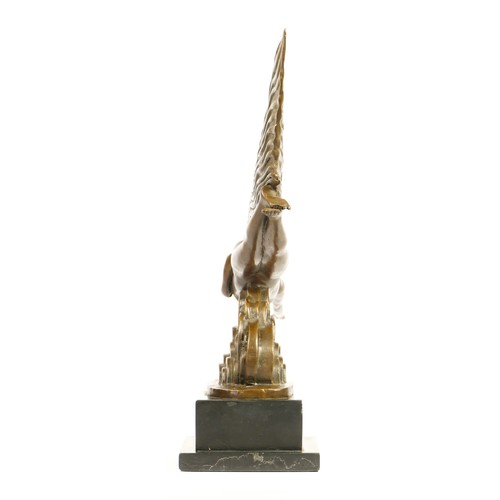 202 - Riviere, an Art Deco style bronze of a flying lady, raised on an onyx base, length 34cm.