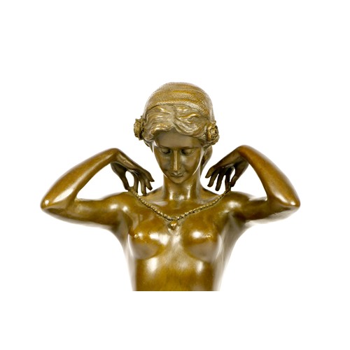 203 - After Paul Ponsard, a bronze of a kneeling nude lady “New Necklace”, raised on an onyx base, 30cm.