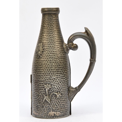 206 - An American Aesthetic Period Britannia metal bottle holder, by Meriden, 1881 patent, with insect and... 