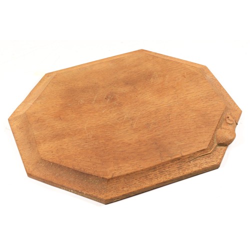 210 - A Robert Mouseman Thompson of Kilburn, octagonal oak cheese board, with carved mouse trademark, 31 x... 