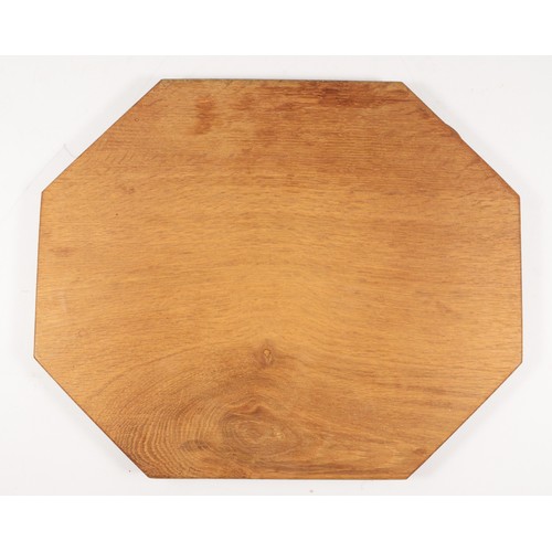 210 - A Robert Mouseman Thompson of Kilburn, octagonal oak cheese board, with carved mouse trademark, 31 x... 