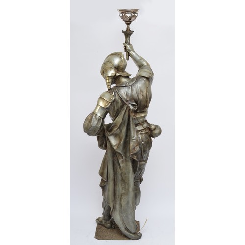 212 - A late 19th/early 20th century French silvered metal figural lamp, in the form of a 16th century war... 