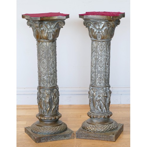 214 - A pair of bronzed metal plated resin columns, acanthus leaf capital to a floral column, female music... 