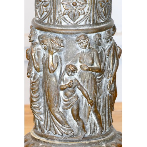 214 - A pair of bronzed metal plated resin columns, acanthus leaf capital to a floral column, female music... 