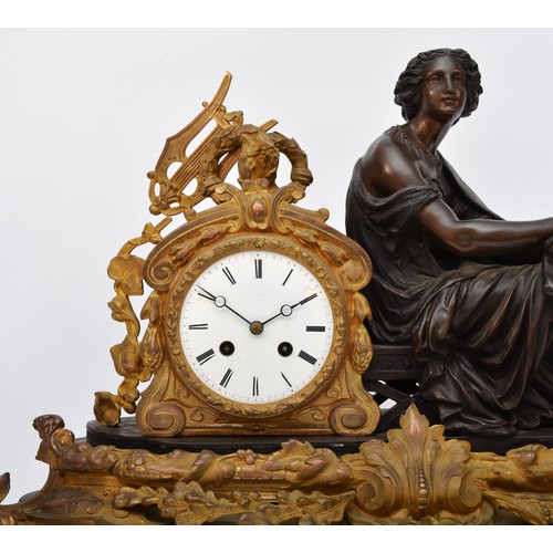 295 - A 19th century French bronzed spelter and gilt metal mantel clock, the white enamel with Roman numer... 