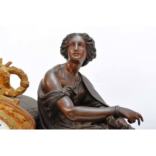 295 - A 19th century French bronzed spelter and gilt metal mantel clock, the white enamel with Roman numer... 