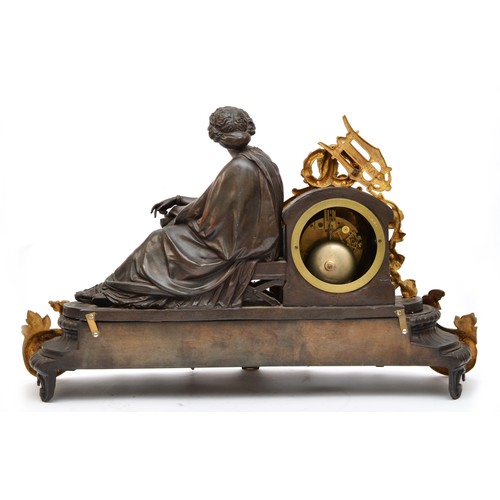 295 - A 19th century French bronzed spelter and gilt metal mantel clock, the white enamel with Roman numer... 