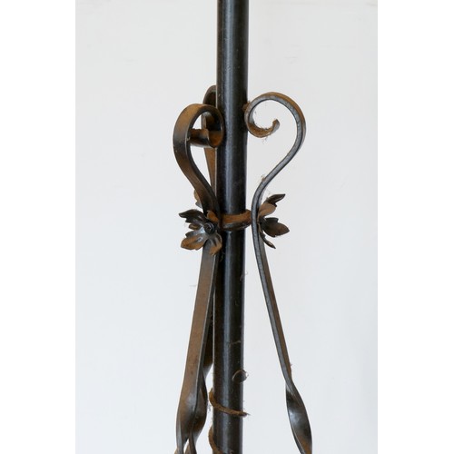 219 - A Victorian wrought iron oil lamp stand, with adjustable column, 117 - 149cm.