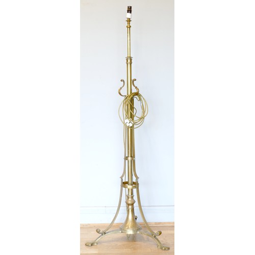 218 - An Arts and Craft W.A.S. Benson style adjustable standard lamp, raised on a tripod base, 145 - 165cm... 