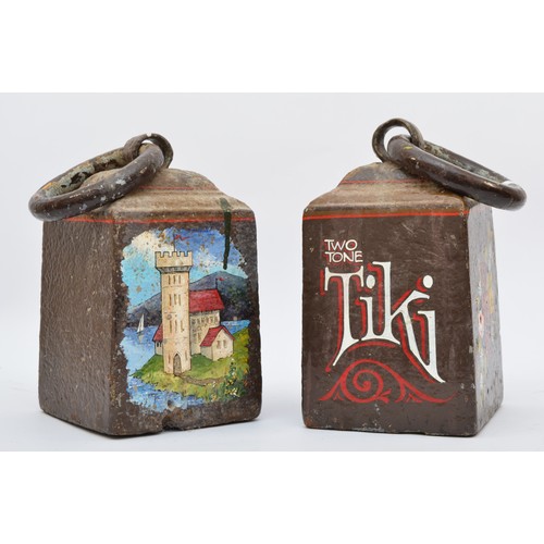 217 - Two 19th century cast iron weights, one painted with TIKI and flowers, the other with castles, 25 x ... 