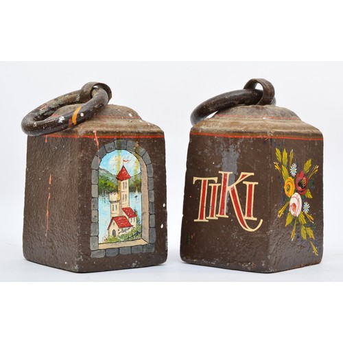 217 - Two 19th century cast iron weights, one painted with TIKI and flowers, the other with castles, 25 x ... 