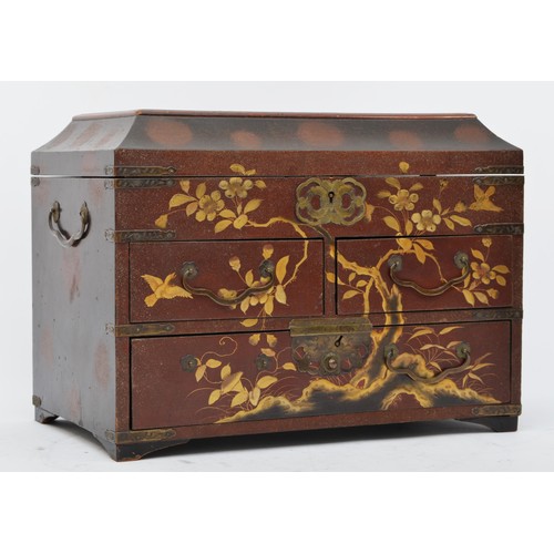 245 - A Japanese lacquer jewellery box, with red and gold floral decoration, hinged lid revealing a fitted... 