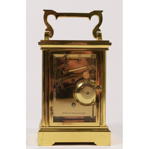 254 - A Harold Cox, Windsor, brass striking carriage clock, white enamel dial, the 13 jewel movement strik... 