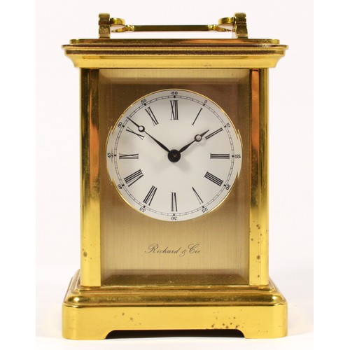 255 - A Richard & Cie, brass striking carriage clock, white enamel dial, the 13 jewel movement striking on... 