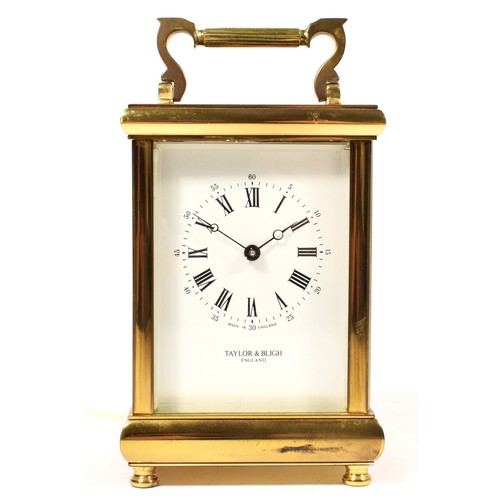 258 - A Taylor & Bligh, brass striking carriage clock, white enamel dial with Roman numerals, the 11 jewel... 