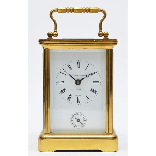 259 - Matthew Norman, London, a brass alarm carriage clock, the white enamel dial with Roman numerals and ... 