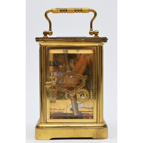 259 - Matthew Norman, London, a brass alarm carriage clock, the white enamel dial with Roman numerals and ... 