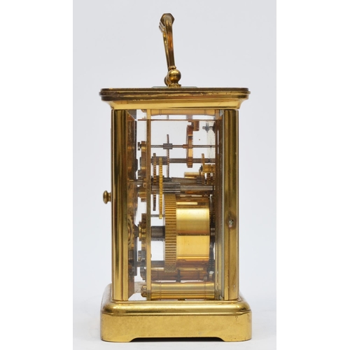 259 - Matthew Norman, London, a brass alarm carriage clock, the white enamel dial with Roman numerals and ... 