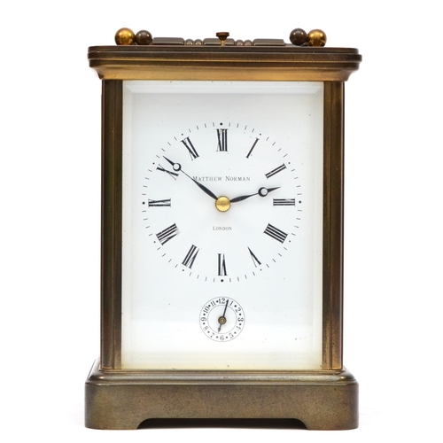 261 - Matthew Norman 1751, London, a Grand Corniche brass alarm/striking/repeating carriage clock, model 1... 