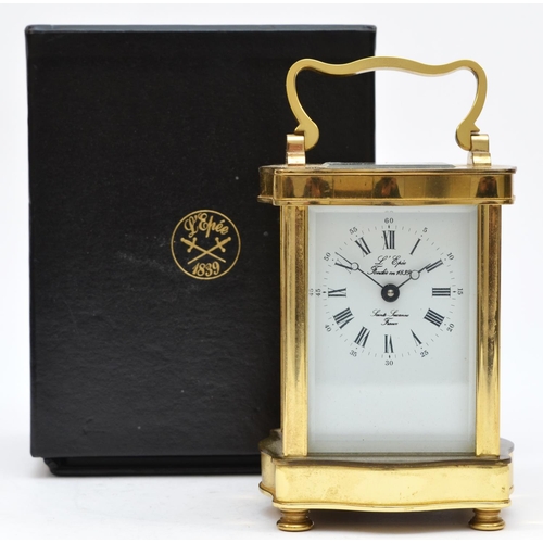 262 - L'Epee, 1839, a French brass ogee shape carriage time piece, the white enamel dial with Roman numera... 