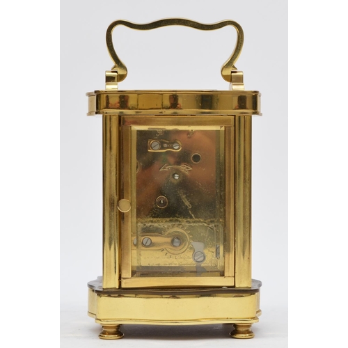 262 - L'Epee, 1839, a French brass ogee shape carriage time piece, the white enamel dial with Roman numera... 