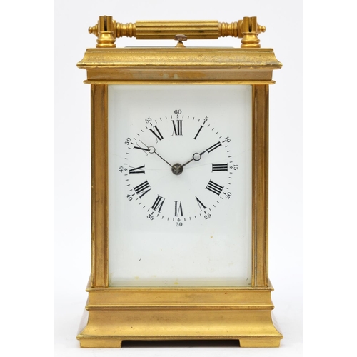 263 - A brass repeating and striking carriage clock, the white enamel dial with Roman numerals, the unsign... 