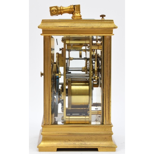 263 - A brass repeating and striking carriage clock, the white enamel dial with Roman numerals, the unsign... 