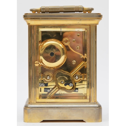 264 - Garrard & Co. London, a large brass striking carriage clock, the white enamel dial with Roman numera... 