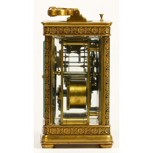 265 - A brass repeating and striking carriage clock, the dial with Arabic numerals, the case with applied ... 