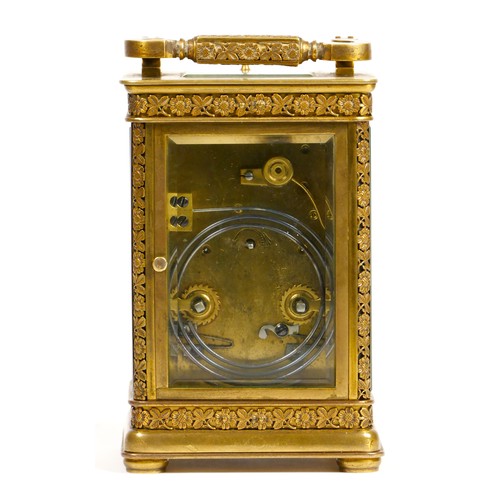 265 - A brass repeating and striking carriage clock, the dial with Arabic numerals, the case with applied ... 