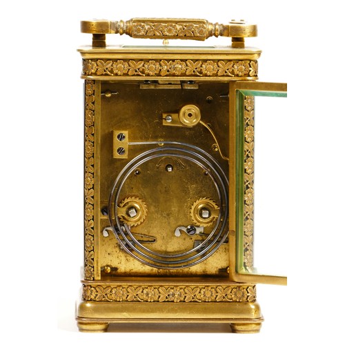 265 - A brass repeating and striking carriage clock, the dial with Arabic numerals, the case with applied ... 