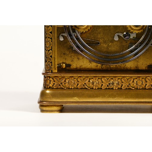 265 - A brass repeating and striking carriage clock, the dial with Arabic numerals, the case with applied ... 