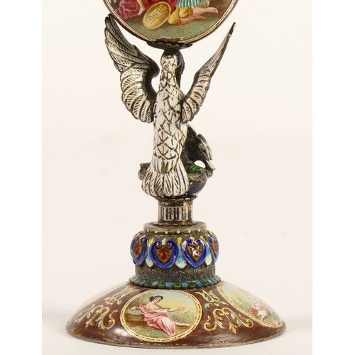 267 - A 19th century Viennese enamel table clock, the oval case containing a pocket watch movement, the ca... 