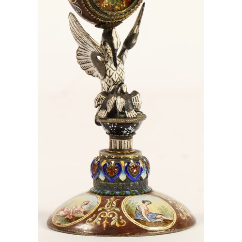 267 - A 19th century Viennese enamel table clock, the oval case containing a pocket watch movement, the ca... 