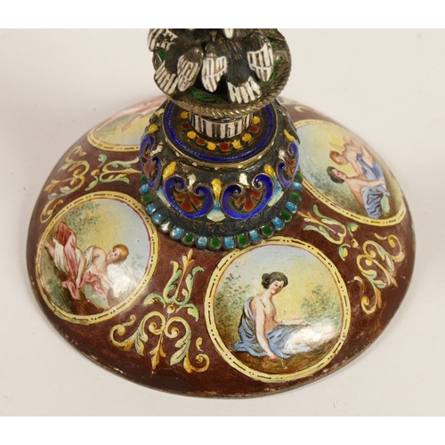 267 - A 19th century Viennese enamel table clock, the oval case containing a pocket watch movement, the ca... 