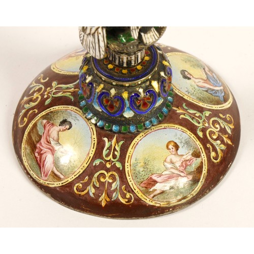 267 - A 19th century Viennese enamel table clock, the oval case containing a pocket watch movement, the ca... 