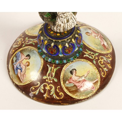 267 - A 19th century Viennese enamel table clock, the oval case containing a pocket watch movement, the ca... 