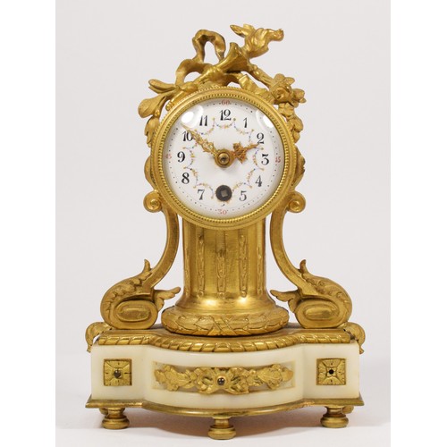 294 - A French 19th century ormolu and white onyx mantel time piece, white enamel dial with floral garland... 