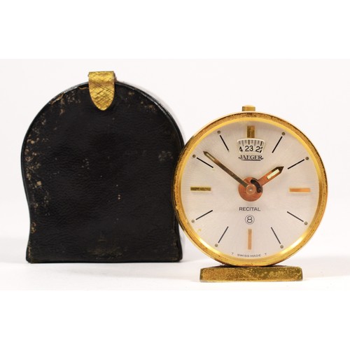 270 - A Jaeger, eight day brass alarm clock, c.1960's, with textured body, diameter 4.5cm, case.