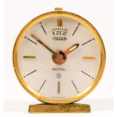 270 - A Jaeger, eight day brass alarm clock, c.1960's, with textured body, diameter 4.5cm, case.