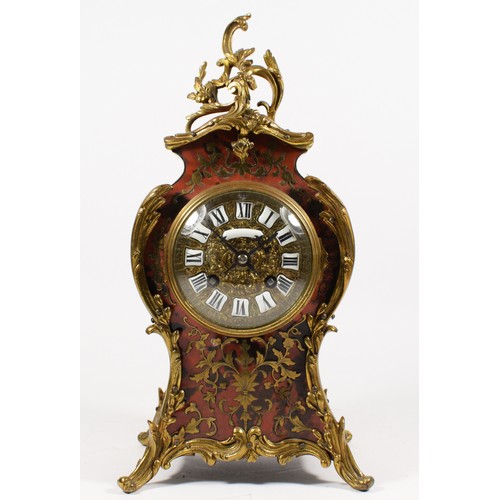 288 - A 19th century French boulle mantel clock, the dial with applied white Roman numerals, the red torto... 