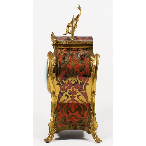 288 - A 19th century French boulle mantel clock, the dial with applied white Roman numerals, the red torto... 