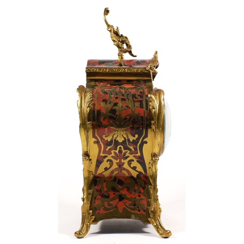 288 - A 19th century French boulle mantel clock, the dial with applied white Roman numerals, the red torto... 