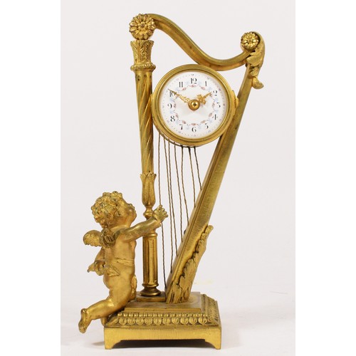 282 - A 19th century French gilt brass mantel clock, the white enamel dial with a floral garland, with a w... 