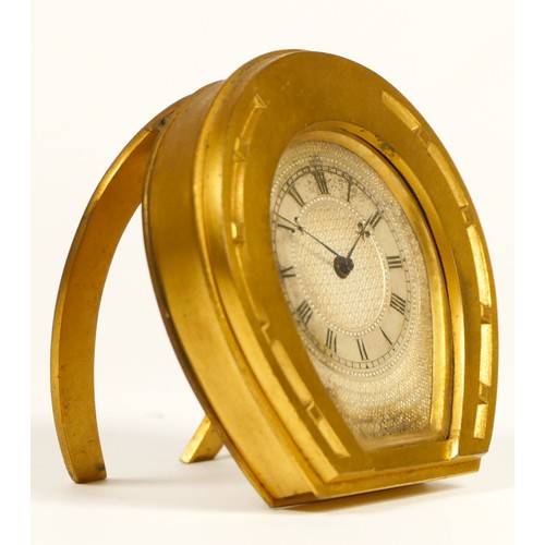 273 - An English ormolu horseshoe clock in the manner of Thomas Cole, 3/4 plate movement with dust covers ... 