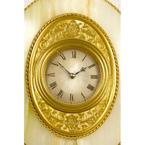 276 - A gilt brass and onyx strut timepiece, retailed by Harry Grant, 29 Torwood St, Torquay, circa 1870, ... 