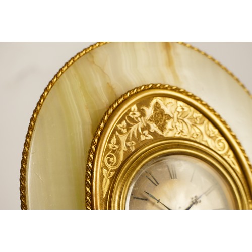 276 - A gilt brass and onyx strut timepiece, retailed by Harry Grant, 29 Torwood St, Torquay, circa 1870, ... 