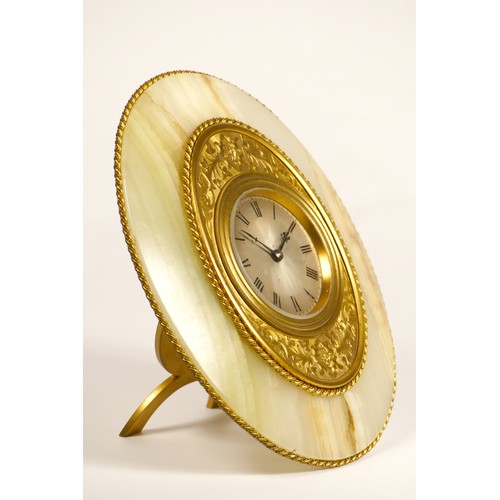 276 - A gilt brass and onyx strut timepiece, retailed by Harry Grant, 29 Torwood St, Torquay, circa 1870, ... 