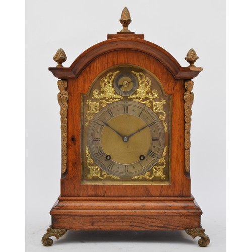 284 - Winterhalder & Hofmeier, a late 19th century walnut arched mantel clock, gilt dial with silvered cha... 